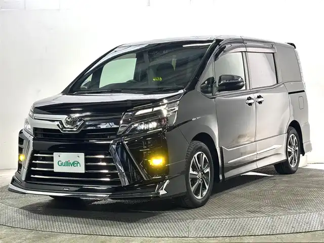 トヨタ ヴォクシー ZS 煌Ⅱ 大阪府 2019(令1)年 4.7万km ブラック モデリスタエアロ 純正10incナビ(フルセグ/DVD再生/Bluetooth) Bカメラ 後席モニター ETC 両側パワースライドドア 衝突軽減 クルコン クリアランスソナー トヨタセーフティセンス