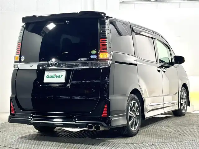 トヨタ ヴォクシー ZS 煌Ⅱ 大阪府 2019(令1)年 4.7万km ブラック モデリスタエアロ 純正10incナビ(フルセグ/DVD再生/Bluetooth) Bカメラ 後席モニター ETC 両側パワースライドドア 衝突軽減 クルコン クリアランスソナー トヨタセーフティセンス