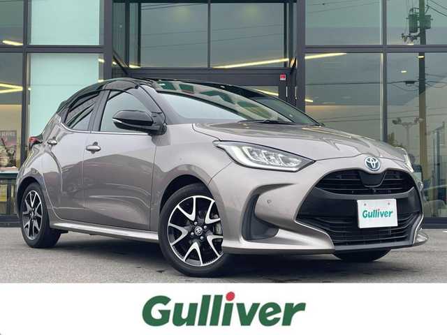 トヨタ ヤリス ハイブリッド Z 愛媛県 2020(令2)年 1.5万km ブラック/アバンギャルドブロンズメタリック 純正9型ディスプレイオーディオ(フルセグTV/BT)/全周囲カメラ/トヨタセーフティセンス/レーダークルーズコントロール/衝突被害軽減装置/車線逸脱防止装置/ブラインドスポットモニター/クリアランスソナー/前後ドライブレコーダー/シートヒーター/LEDヘッドライト/オートライト/オートマチックハイビーム/電格ミラー/ヒートミラー/ステアリングリモコン/シガーソケット/ETC/現状サマー(純正AW)(185/55/R16)/BRIDGESTONE EcoPia EP150/禁煙車