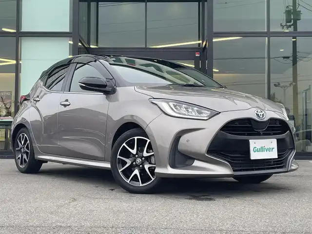 トヨタ ヤリス ハイブリッド Z 愛媛県 2020(令2)年 1.5万km ブラック/アバンギャルドブロンズメタリック 純正9型ディスプレイオーディオ(フルセグTV/BT)/全周囲カメラ/トヨタセーフティセンス/レーダークルーズコントロール/衝突被害軽減装置/車線逸脱防止装置/ブラインドスポットモニター/クリアランスソナー/前後ドライブレコーダー/シートヒーター/LEDヘッドライト/オートライト/オートマチックハイビーム/電格ミラー/ヒートミラー/ステアリングリモコン/シガーソケット/ETC/現状サマー(純正AW)(185/55/R16)/BRIDGESTONE EcoPia EP150/禁煙車