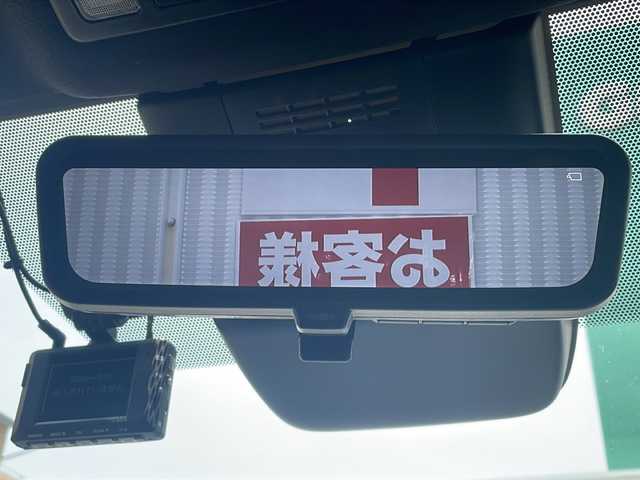 トヨタ ヴォクシー ハイブリッド S－Z 高知県 2022(令4)年 4.5万km アティチュードブラックマイカ 純正ディスプレイオーディオ/(Bluetooth/USB/type-C/HDMI/Miracast/フルセグ)/ビルトインETC2.0/前後ドライブレコーダー/アラウンドビューモニター/デジタルインナーミラー/ブラインドスポットモニター/アダプティブクルーズコントロール/シートヒーター/ハーフレザーシート/両側パワースライドドア/純正17インチアルミホイール/レーンキープアシスト/パワーバックドア/オートライト/オートマチックハイビーム/LEDヘッドライト/プッシュスタート/スマートキー/スペアキー/AC100V充電/電動パーキングホールド/オートブレーキホールド/オットマン/3列シート/純正ドアバイザー/純正フロアマット/リアロールサンシェード/電動格納ミラー/横滑り防止装置/盗難防止装置/衝突被害軽減ブレーキ