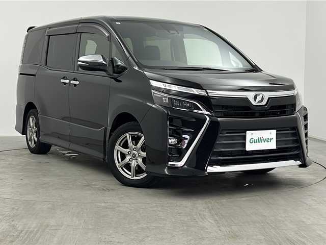 トヨタ ヴォクシー ZS 煌 三重県 2018(平30)年 6.9万km ブラック 禁煙車/ALPINE11型ナビ/　フルセグTV/CD/DVD/Bluetooth/ALPINE後席モニター/両側パワースライドドア/社外アルミホイール/衝突軽減ブレーキシステム/レーンキープアシストシステム/オートハイビーム/オートライト/プッシュスタート/スマートキー/バックカメラ/前方ドラレコ/フォグライト/ETC