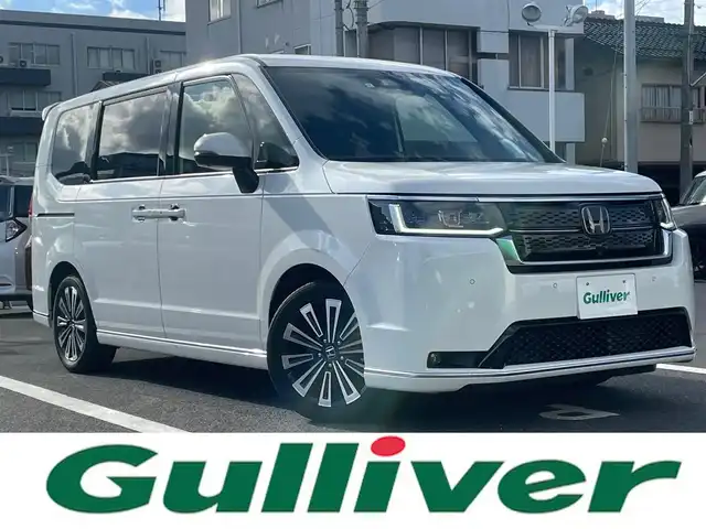 ホンダ ステップワゴン スパーダ eHEV プレミアムライン 島根県 2023(令5)年 3.5万km プラチナホワイトパール ワンオーナー/純正１１型メモリナビ　/フルセグＴＶ・ＤＶＤ再生・Ｂｌｕｅｔｏｏｔｈ/全方位カメラ　/ビルトインETC /前後ドライブレコーダー/純正フリップダウンモニター/アダプティブクルーズコントロール　/両側パワースライド/電動バックドア/ハーフレザーシート/レーンキープアシスト　/衝突軽減システム　/盗難防止装置　/前後コーナーセンサー　/前席シートヒーター/純正LEDライト/純正フロアマット/純正17インチアルミホイール