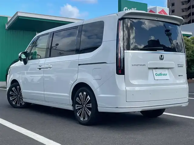 ホンダ ステップワゴン スパーダ eHEV プレミアムライン 島根県 2023(令5)年 3.5万km プラチナホワイトパール ワンオーナー/純正１１型メモリナビ　/フルセグＴＶ・ＤＶＤ再生・Ｂｌｕｅｔｏｏｔｈ/全方位カメラ　/ビルトインETC /前後ドライブレコーダー/純正フリップダウンモニター/アダプティブクルーズコントロール　/両側パワースライド/電動バックドア/ハーフレザーシート/レーンキープアシスト　/衝突軽減システム　/盗難防止装置　/前後コーナーセンサー　/前席シートヒーター/純正LEDライト/純正フロアマット/純正17インチアルミホイール