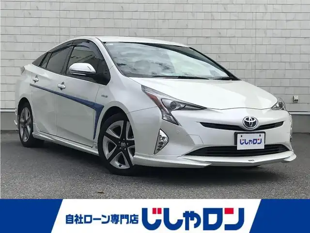 トヨタ プリウス S ツーリングセレクション 栃木県 2015(平27)年 14.1万km ホワイトパールクリスタルシャイン 株)IDOMが運営する【じしゃロン小山店】の自社ローン専用車両になります。こちらは現金またはオートローンご利用時の価格です。自社ローンご希望の方は別途その旨お申付け下さい//禁煙車/純正フルセグナビ/（CD/DVD/AM/FMラジオ）/(Bluetooth)/スマートキー/プッシュスタート/バックカメラ/ＥＴＣ/ドライブレコーダー/デジタルインナーミラー/シートヒーター/ステアリングリモコン/電動格納ドアミラー/パワーウインドウ/防眩ミラー/オートライト/ＴＯＭ’Ｓエアロ