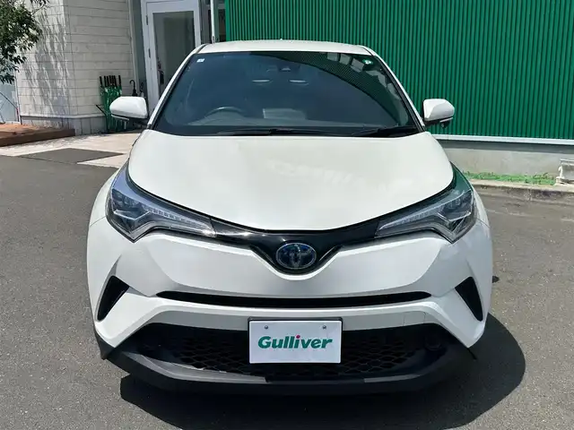 トヨタ Ｃ－ＨＲ S LEDパッケージ 宮城県 2019(令1)年 7.3万km ホワイトパールクリスタルシャイン 社外メモリーナビ/フルセグテレビ/　【AM/FM/CD/DVD/Bluetooth/iPod/SD】/ToyotaSafetySense/　・衝突軽減ブレーキ/　・レーダークルーズコントロール/　・レーンキープアシスト/　・オートハイビーム/電子パーキングブレーキ/オートブレーキホールド/LEDヘッドライト/オートライト/ビルトインETC/バックカメラ/純正フロアマット/純正17インチアルミホイール/ステアリングスイッチ/革巻きステアリング/プッシュスタート/スマートキー/電動格納ウィンカーミラー/ドアバイザー