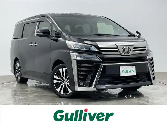 トヨタ ヴェルファイア Z Gエディション 大分県 2019(令1)年 6.4万km 黒 純正ナビ（NSZN-Z68T）/（AM/FM/BT/フルセグTV）/レーダークルーズコントロール/バックカメラ/ツインサンルーフ/前席パワーシート（D席メモリ付き）/前席後席シートヒーター/前席後席エアシート/ステアリングヒーター/オットマン/両側パワースライドドア/オートライト/オートハイビーム/純正18インチアルミホイール/純正フロアマット