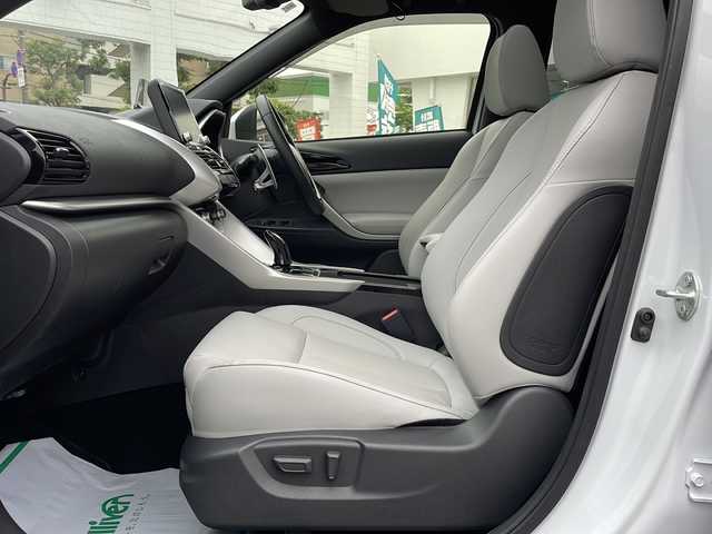 三菱 エクリプス クロス ＰＨＥＶ P 東京都 2022(令4)年 1.7万km ホワイトダイヤモンド ワンオーナー/新車時保証書　整備記録簿　/ナビ取説　取扱説明書/衝突被害軽減ブレーキ/車線逸脱警報/レーダークルーズコントロール/後側方車両検知警報/誤発進制御機能【前後】/純正ナビ/フルセグTV/BT/USB(オーディオ・ビデオ)//Apple CarPlay Android Auto/三菱パワーサウンドシステム/HUD/マルチアランドモニター　ETC2/0/LEDヘッドライト/オートライト/スマートキー×2/コーナーセンサー/ヒーター機能付き革巻きハンドル/レザーシート/全席シートヒーター/D/N席パワーシート/AC100V1500W/純正18インチアルミ
