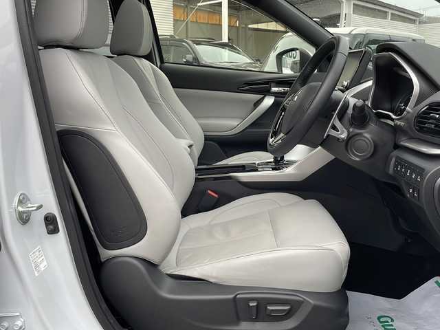 三菱 エクリプス クロス ＰＨＥＶ P 東京都 2022(令4)年 1.7万km ホワイトダイヤモンド ワンオーナー/新車時保証書　整備記録簿　/ナビ取説　取扱説明書/衝突被害軽減ブレーキ/車線逸脱警報/レーダークルーズコントロール/後側方車両検知警報/誤発進制御機能【前後】/純正ナビ/フルセグTV/BT/USB(オーディオ・ビデオ)//Apple CarPlay Android Auto/三菱パワーサウンドシステム/HUD/マルチアランドモニター　ETC2/0/LEDヘッドライト/オートライト/スマートキー×2/コーナーセンサー/ヒーター機能付き革巻きハンドル/レザーシート/全席シートヒーター/D/N席パワーシート/AC100V1500W/純正18インチアルミ
