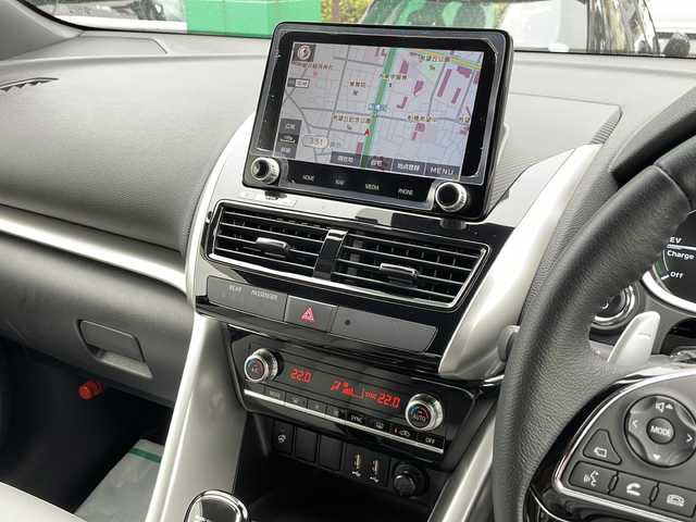 三菱 エクリプス クロス ＰＨＥＶ P 東京都 2022(令4)年 1.7万km ホワイトダイヤモンド ワンオーナー/新車時保証書　整備記録簿　/ナビ取説　取扱説明書/衝突被害軽減ブレーキ/車線逸脱警報/レーダークルーズコントロール/後側方車両検知警報/誤発進制御機能【前後】/純正ナビ/フルセグTV/BT/USB(オーディオ・ビデオ)//Apple CarPlay Android Auto/三菱パワーサウンドシステム/HUD/マルチアランドモニター　ETC2/0/LEDヘッドライト/オートライト/スマートキー×2/コーナーセンサー/ヒーター機能付き革巻きハンドル/レザーシート/全席シートヒーター/D/N席パワーシート/AC100V1500W/純正18インチアルミ