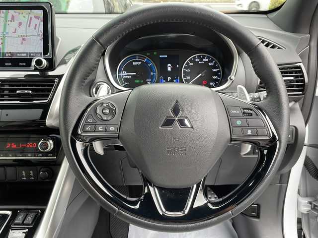 三菱 エクリプス クロス ＰＨＥＶ P 東京都 2022(令4)年 1.7万km ホワイトダイヤモンド ワンオーナー/新車時保証書　整備記録簿　/ナビ取説　取扱説明書/衝突被害軽減ブレーキ/車線逸脱警報/レーダークルーズコントロール/後側方車両検知警報/誤発進制御機能【前後】/純正ナビ/フルセグTV/BT/USB(オーディオ・ビデオ)//Apple CarPlay Android Auto/三菱パワーサウンドシステム/HUD/マルチアランドモニター　ETC2/0/LEDヘッドライト/オートライト/スマートキー×2/コーナーセンサー/ヒーター機能付き革巻きハンドル/レザーシート/全席シートヒーター/D/N席パワーシート/AC100V1500W/純正18インチアルミ