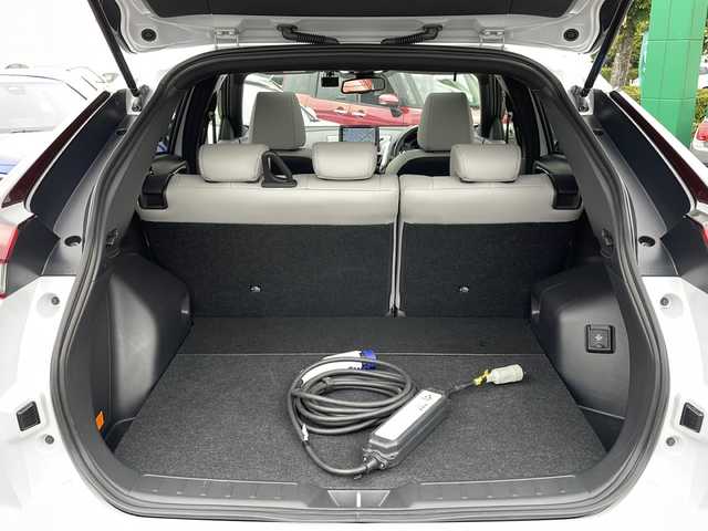 三菱 エクリプス クロス ＰＨＥＶ P 東京都 2022(令4)年 1.7万km ホワイトダイヤモンド ワンオーナー/新車時保証書　整備記録簿　/ナビ取説　取扱説明書/衝突被害軽減ブレーキ/車線逸脱警報/レーダークルーズコントロール/後側方車両検知警報/誤発進制御機能【前後】/純正ナビ/フルセグTV/BT/USB(オーディオ・ビデオ)//Apple CarPlay Android Auto/三菱パワーサウンドシステム/HUD/マルチアランドモニター　ETC2/0/LEDヘッドライト/オートライト/スマートキー×2/コーナーセンサー/ヒーター機能付き革巻きハンドル/レザーシート/全席シートヒーター/D/N席パワーシート/AC100V1500W/純正18インチアルミ