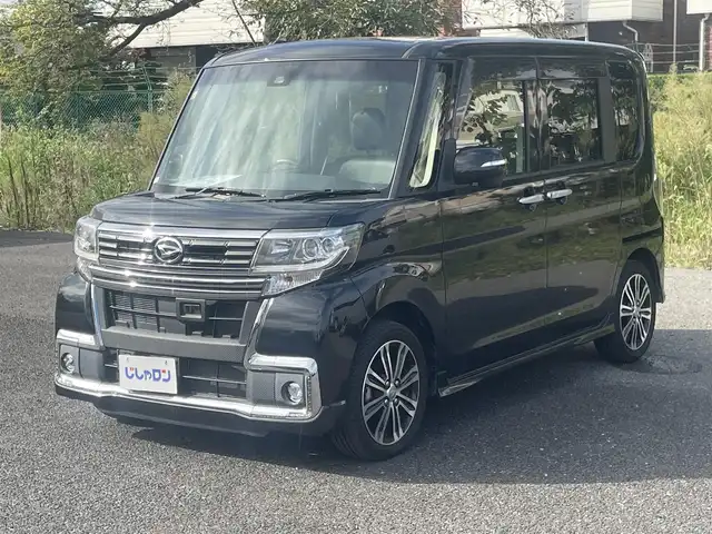 ダイハツ タント カスタム RS SAⅡ 埼玉県 2016(平28)年 10.1万km ブラックマイカメタリック (株)IDOMが運営する【じしゃロン鳩ヶ谷店】の自社ローン専用車両になりますこちらは現金またはオートローンご利用時の価格です。自社ローンご希望の方は別途その旨お申付け下さい/登録時100913km/スマートアシストII/・衝突回避支援ブレーキ機能/・衝突警報機能/・車線逸脱警報機能/・誤発進抑制制御機能/・先行車発進お知らせ機能/ターボ車/両側パワースライドドア/純正SDナビ（NSZN-X66D-T3）/　・AM/FM/CD/DVD/MSV(SD)/BT/フルセグテレビ/バックカメラ/USB/HDMI/アイドリングストップ/プッシュスタート/スマートキーx1/ETC/純正15インチAW/純正LEDヘッドライト/　・オートライト/フォグランプ/革巻ステアリング/　・ステアリングリモコン/電動格納機能付きウインカーミラー/後席ロールサンシェード