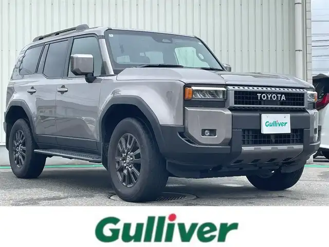 トヨタ ランドクルーザー ２５０ VX 富山県 2024(令6)年 0.8万km アバンギャルドブロンズメタリック サンルーフ／/パノラミックビューモニター／/純正１２．３インチナビ／/フルセグＴＶ／/Ｂｌｕｅｔｏｏｔｈ／/ＨＤＭｉ入力端子／/タイプＣ／/置くだけ充電／/運転席パワーシート/革シート／/シートヒーター／/エアシート/衝突軽減ブレーキ/オートマチックハイビーム/レーダークルーズコントロール/レーンキープアシスト/ルーフレール／/LEDオートライト/LEDフォグライト/コーナーセンサー