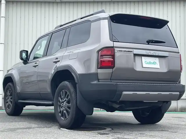 トヨタ ランドクルーザー ２５０ VX 富山県 2024(令6)年 0.8万km アバンギャルドブロンズメタリック サンルーフ／/パノラミックビューモニター／/純正１２．３インチナビ／/フルセグＴＶ／/Ｂｌｕｅｔｏｏｔｈ／/ＨＤＭｉ入力端子／/タイプＣ／/置くだけ充電／/運転席パワーシート/革シート／/シートヒーター／/エアシート/衝突軽減ブレーキ/オートマチックハイビーム/レーダークルーズコントロール/レーンキープアシスト/ルーフレール／/LEDオートライト/LEDフォグライト/コーナーセンサー