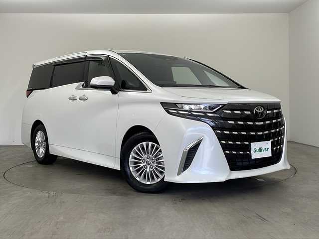 トヨタ アルファードハイブリット X 兵庫県 2025(令7)年 0.5万km プラチナホワイトパールマイカ ・トヨタセーフティーセンス/・プリクラッシュセーフティ/・レーダークルーズコントロール/・レーンディバチャーアラート/・ロードサインアシスト/・リヤクロストラフィックアラート/・後方車両接近告知/・プロアクティブドライビングアシスト/・パーキングサポートブレーキ/・安心降車アシスト/・周辺車両接近時サポート/・クリアランスソナー/・ブラインドスポットモニター/・純正9.8型ディスプレイオーディオ＆フルセグ＆BT＆USB/・パノラマミックビューモニター/・純正前後ドライブレコーダー/・デジタルインナーミラー/・横滑り防止装置/・電動パーキングブレーキ/・AC100V電源/・オートマチックハイビーム/・LEDヘッドライト/・フォグ/・オートライト/・後席サンシェード/・スマートキー/・スペアキー/・プッシュスタート/・W＋サイドエアバック/・カーテンエアバック