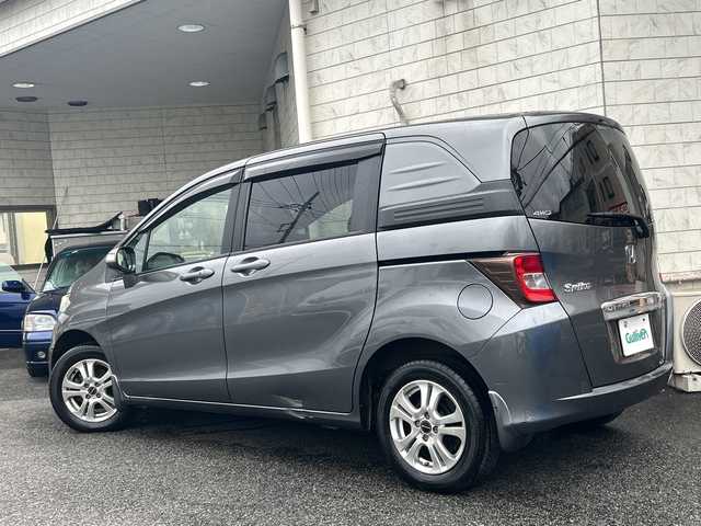 ホンダ フリード スパイク G ジャストセレクション 神奈川県 2012(平24)年 9.5万km ポリッシュドメタルメタリック 純正ナビ（CD/DVD/AM/FM/ワンセグTV)/バックカメラ/ETC/クルーズコントロール/両側パワースライドドア/純正マット/社外アルミホイール/盗難防止装置/ABS/横滑り防止装置/エアバッグダブル+サイド/カーテンエアバッグ/電動格納ミラー/ドアバイザー/ISOFIX/オートライト/フォグランプ/スペアキー×１/取扱説明書