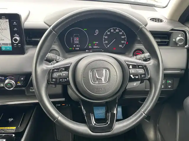 ホンダ ヴェゼル ハイブリッド e:HEV Z 大阪府 2021(令3)年 4.1万km メテオロイドグレーメタリック 純正９インチナビ/   フルセグTV/Bluetooth/USB/バックモニター/衝突軽減ブレーキ/横滑り防止装置/コーナーセンサー/ＢＳＭ/前席シートヒーター/レーダークルーズコントロール/レーンキープアシスト/アイドリングストップ/パドルシフト/ワイヤレス充電/前後ドライブレコーダー/オートマチックハイビーム/純正18インチアルミホイール/純正フロアマット/プッシュスタート/スマートキー/ハーフレザーシート/ＥＴＣ/ＬＥＤ/禁煙車