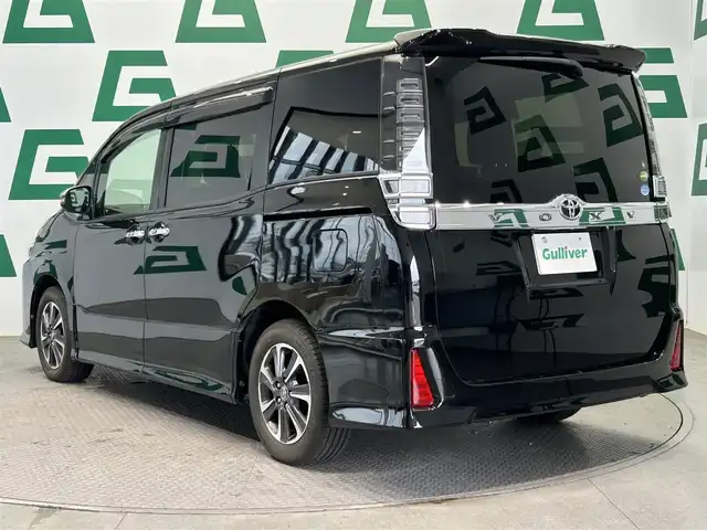 トヨタ ヴォクシー ZS 煌 鹿児島県 2019(平31)年 2.7万km ブラック 禁煙車/純正ナビ（NSZT-Y68T）/両側パワースライドドア/360度ドライブレコーダー（DVR-360V）/ビルトインETC/フルセグTV/トヨタセーフティセンスC/プリクラッシュセーフティシステム/レーンディパーチャーアラート/オートマチックハイビーム/クルーズコントロール/レーンキープアシスト/オートライト/LEDヘッドライト/社外フロアマット/横滑り防止装置/盗難防止装置