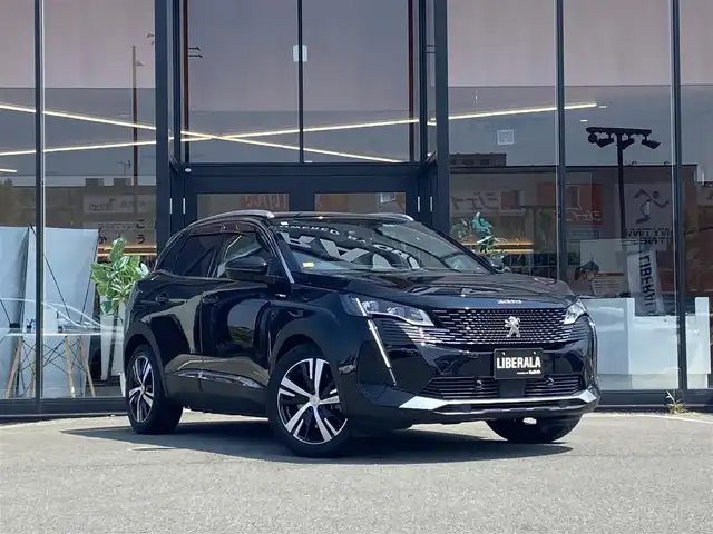 プジョー ３００８ GT ハイブリッド4 福岡県 2021(令3)年 2.2万km 黒 ・アクティブクルーズコントロール/・USB/Bluetooth/AppleCarPlay/・バックカメラ/・ハーフレザーシート/シートヒーター/・社外前後ドライブレコーダー/・フルセグ/・社外ETC/・純正18AW/・プッシュスタート/・スマートキー/・スペアキー/・パワーシート/・レーンキープアシスト/・オートライト/・LEDライト/・置くだけ充電/・保証書/・取扱説明書