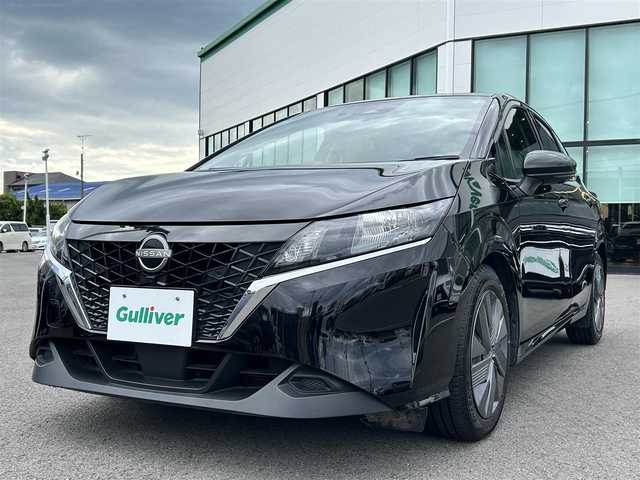 日産 ノート X 愛媛県 2022(令4)年 8.2万km スーパーブラック 登録時走行距離:81119km/メーカーOP純正ナビ/AM/FM//フルセグTV/Bluetooth/全方位カメラ/ビルトインETC2.0/衝突軽減システム/レーンキープアシスト/オートライト/オートハイビーム/エンジンスタートボタン/スマートキー/純正アルミホイール/コーナーセンサー/ワイヤレス充電/チャイルドシート取り付け可能/ハンドル支援/ブラインドスポットモニター