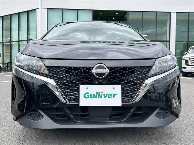 日産 ノート X 愛媛県 2022(令4)年 8.2万km スーパーブラック 登録時走行距離:81119km/メーカーOP純正ナビ/AM/FM//フルセグTV/Bluetooth/全方位カメラ/ビルトインETC2.0/衝突軽減システム/レーンキープアシスト/オートライト/オートハイビーム/エンジンスタートボタン/スマートキー/純正アルミホイール/コーナーセンサー/ワイヤレス充電/チャイルドシート取り付け可能/ハンドル支援/ブラインドスポットモニター