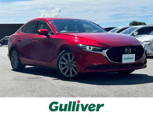 マツダ マツダ３セダン 20S Lパッケージ 奈良県 2019(令1)年 1.6万km ソウルレッドクリスタルM 純正ナビ(フルセグTV/CD/DVD/AM・FM/BT/USB/HDMI)/アラウンドビューモニター/ETC/ステアリングヒーター/運転席パワーシート/前席シートヒーター/i-ACTIVSENSE/クルーズコントロール/SBS(スマートブレーキサポート)/BSM(ブラインドスポットモニター)/クルーズコントロール/オートブレーキホールド/純正18インチアルミホイール/純正フロアマット