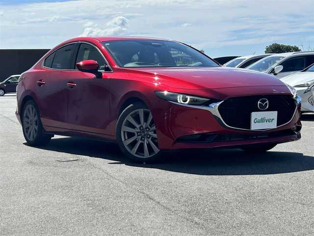マツダ マツダ３セダン 20S Lパッケージ 奈良県 2019(令1)年 1.6万km ソウルレッドクリスタルM 純正ナビ(フルセグTV/CD/DVD/AM・FM/BT/USB/HDMI)/アラウンドビューモニター/ETC/ステアリングヒーター/運転席パワーシート/前席シートヒーター/i-ACTIVSENSE/クルーズコントロール/SBS(スマートブレーキサポート)/BSM(ブラインドスポットモニター)/クルーズコントロール/オートブレーキホールド/純正18インチアルミホイール/純正フロアマット
