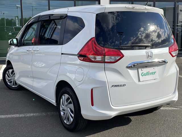 ホンダ フリード G ホンダセンシング 道東・釧路十勝 2018(平30)年 7.2万km ホワイトオーキッドパール ・４WD/・社外SDメモリナビ/（CD・DVD・BT・フルセグ・SD・ipod）/・バックカメラ/・両側パワースライドドア/・横滑り防止装置/・ワイパーデアイサー/・ホンダセンシング/・ビルトインETC/・レーダークルーズコントロール/・スマートキー/・プッシュスタート/・ステアリングスイッチ/・前席シートヒーター/・純正フロアマット/・ドアバイザー