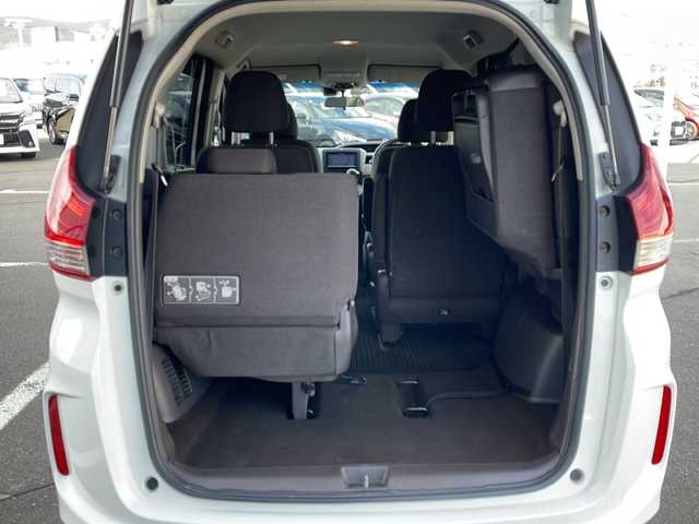 ホンダ フリード G ホンダセンシング 道東・釧路十勝 2018(平30)年 7.2万km ホワイトオーキッドパール ・４WD/・社外SDメモリナビ/（CD・DVD・BT・フルセグ・SD・ipod）/・バックカメラ/・両側パワースライドドア/・横滑り防止装置/・ワイパーデアイサー/・ホンダセンシング/・ビルトインETC/・レーダークルーズコントロール/・スマートキー/・プッシュスタート/・ステアリングスイッチ/・前席シートヒーター/・純正フロアマット/・ドアバイザー