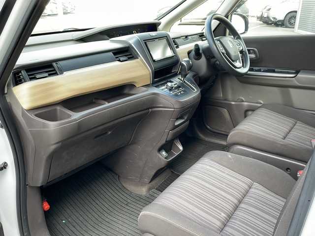 ホンダ フリード G ホンダセンシング 道東・釧路十勝 2018(平30)年 7.2万km ホワイトオーキッドパール ・４WD/・社外SDメモリナビ/（CD・DVD・BT・フルセグ・SD・ipod）/・バックカメラ/・両側パワースライドドア/・横滑り防止装置/・ワイパーデアイサー/・ホンダセンシング/・ビルトインETC/・レーダークルーズコントロール/・スマートキー/・プッシュスタート/・ステアリングスイッチ/・前席シートヒーター/・純正フロアマット/・ドアバイザー