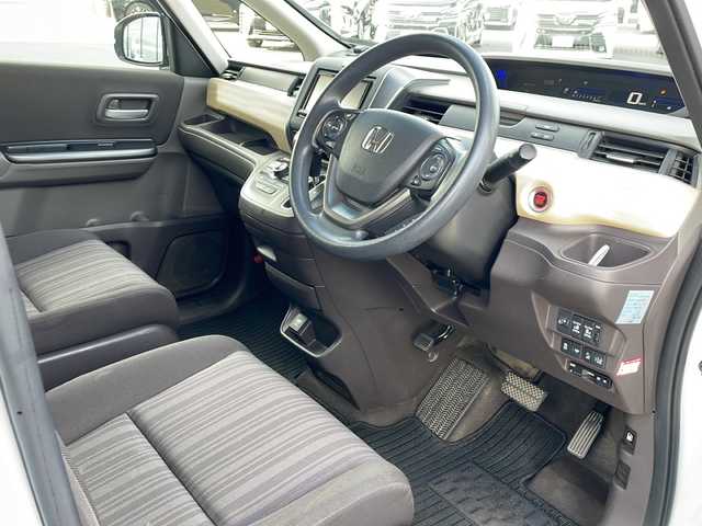 ホンダ フリード G ホンダセンシング 道東・釧路十勝 2018(平30)年 7.2万km ホワイトオーキッドパール ・４WD/・社外SDメモリナビ/（CD・DVD・BT・フルセグ・SD・ipod）/・バックカメラ/・両側パワースライドドア/・横滑り防止装置/・ワイパーデアイサー/・ホンダセンシング/・ビルトインETC/・レーダークルーズコントロール/・スマートキー/・プッシュスタート/・ステアリングスイッチ/・前席シートヒーター/・純正フロアマット/・ドアバイザー