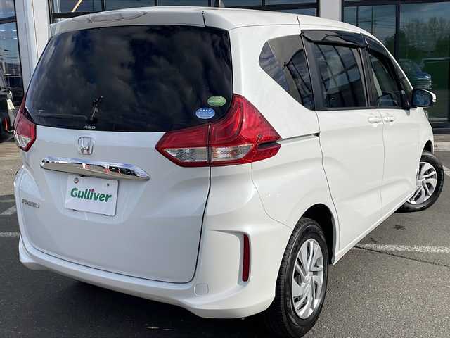 ホンダ フリード G ホンダセンシング 道東・釧路十勝 2018(平30)年 7.2万km ホワイトオーキッドパール ・４WD/・社外SDメモリナビ/（CD・DVD・BT・フルセグ・SD・ipod）/・バックカメラ/・両側パワースライドドア/・横滑り防止装置/・ワイパーデアイサー/・ホンダセンシング/・ビルトインETC/・レーダークルーズコントロール/・スマートキー/・プッシュスタート/・ステアリングスイッチ/・前席シートヒーター/・純正フロアマット/・ドアバイザー