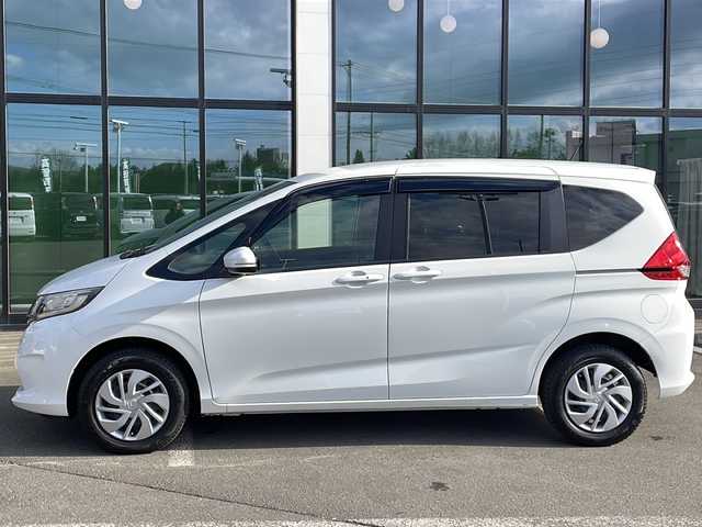 ホンダ フリード G ホンダセンシング 道東・釧路十勝 2018(平30)年 7.2万km ホワイトオーキッドパール ・４WD/・社外SDメモリナビ/（CD・DVD・BT・フルセグ・SD・ipod）/・バックカメラ/・両側パワースライドドア/・横滑り防止装置/・ワイパーデアイサー/・ホンダセンシング/・ビルトインETC/・レーダークルーズコントロール/・スマートキー/・プッシュスタート/・ステアリングスイッチ/・前席シートヒーター/・純正フロアマット/・ドアバイザー