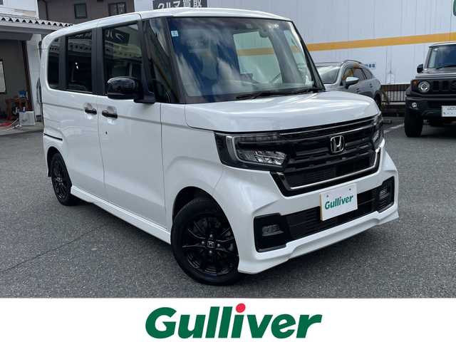 ホンダ Ｎ ＢＯＸ カスタム L スタイル+ブラック 山口県 2024(令6)年 1.3万km プラチナホワイトパール ワンオーナー/純正9インチナビ/DVD/CD/SD/MSV/BT/フルセグTV/バックカメラ/両側パワースライドドア/純正LEDヘッドライト/純正フォグランプ/オートライト/ヘッドライトレベライザー/純正14インチアルミホイール/革巻きステアリング/ステアリングスイッチ/クルーズコントロール/前席シートヒーター/衝突被害軽減ブレーキ/LKA/横滑り防止/コーナーセンサー/オートパーキングホールド/スマートキー×２/ドラレコ/純正ゴムフロアマット/ETC/電動格納ウインカードアミラー
