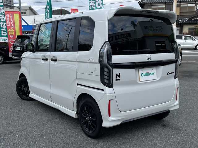 ホンダ Ｎ ＢＯＸ カスタム L スタイル+ブラック 山口県 2024(令6)年 1.3万km プラチナホワイトパール ワンオーナー/純正9インチナビ/DVD/CD/SD/MSV/BT/フルセグTV/バックカメラ/両側パワースライドドア/純正LEDヘッドライト/純正フォグランプ/オートライト/ヘッドライトレベライザー/純正14インチアルミホイール/革巻きステアリング/ステアリングスイッチ/クルーズコントロール/前席シートヒーター/衝突被害軽減ブレーキ/LKA/横滑り防止/コーナーセンサー/オートパーキングホールド/スマートキー×２/ドラレコ/純正ゴムフロアマット/ETC/電動格納ウインカードアミラー
