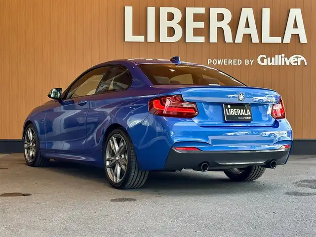 ＢＭＷ Ｍ２３５ｉ クーペ 宮城県 2014(平26)年 8.7万km エストリル・ブルー インテリジェントセーフティ/レーンディパーチャーウォーニング/iDriveナビゲーションシステム/バックカメラ/パークディスタンスコントロール/クルーズコントロール/D/Nパワーシート/ミラー一体型ETC/ドライブレコーダー/コンフォートアクセス/プッシュエンジンスタート/キセノンヘッドライト/オートライト/ステアリングスイッチ/アイドリングストップ/純正18インチAW/保証書・取扱説明書