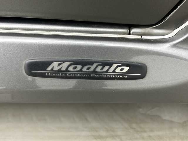 ホンダ モビリオ W 愛知県 2004(平16)年 2.2万km グレー 純正6型HDDナビ/（AM/FM/HDD）/バックカメラ/モデューロエアロ/（フロント・サイド・リア）/スペアキー１本/片側電動スライドドア/３列シート/純正フロアマット/純正14インチアルミホイール/リモコンキー/スペアタイヤ/電動格納ミラー