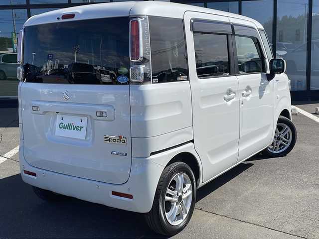 スズキ スペーシア HYBRID X 道東・釧路十勝 2018(平30)年 6.4万km ピュアホワイトP ・４WD/・社外メモリナビ/（CD・DVD・BT・フルセグ・SD・USB・ラジオ）/・テレビキャンセラー/・ヘッドアップディスプレイ/・全周囲カメラ/・両側パワースライドドア/・前席シートヒーター/・スズキセーフティサポート/・衝突被害軽減ブレーキ/・横滑り防止装置/・後方コーナーセンサー/・リアサーキュレーター/・ステアリングスイッチ/・アイドリングストップ/・スマートキー/・プッシュスタート/・社外１４インチアルミホイール