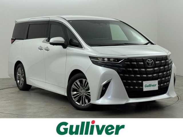 トヨタ アルファードハイブリット Z 福岡県 2024(令6)年 1.5万km プラチナホワイトパールマイカ 純正１４型ＤＡナビ／全方位カメラ　/ワイヤレス充電　/デジタルルームミラー　/ビルトインETC２．０　/前後ドライブレコーダー　/トヨタセーフティセンス　/レーダークルーズコントロール　/コーナーセンサー　/衝突軽減ブレーキ　/レーンキープ　/ブラインドスポットモニター　/アクセル踏み間違い防止　/両側電動スライドドア　/パワーバックドア　/シートベンチレーション／ヒーター　/ステアリングヒーター　/シートメモリー付きパワーシート　/３眼ＬＥＤ
