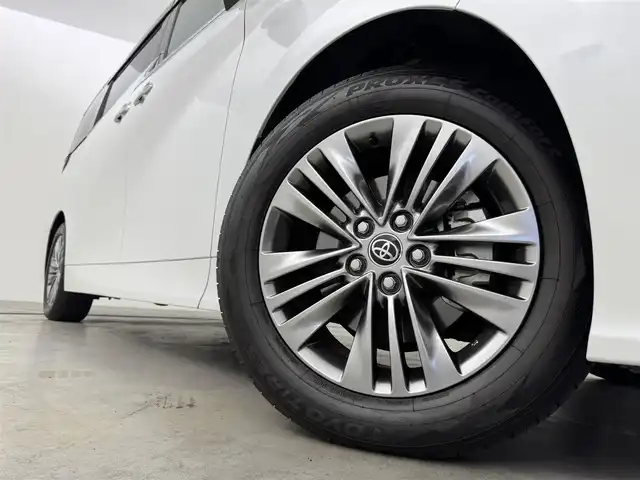 トヨタ アルファードハイブリット Z 福岡県 2024(令6)年 1.5万km プラチナホワイトパールマイカ 純正１４型ＤＡナビ／全方位カメラ　/ワイヤレス充電　/デジタルルームミラー　/ビルトインETC２．０　/前後ドライブレコーダー　/トヨタセーフティセンス　/レーダークルーズコントロール　/コーナーセンサー　/衝突軽減ブレーキ　/レーンキープ　/ブラインドスポットモニター　/アクセル踏み間違い防止　/両側電動スライドドア　/パワーバックドア　/シートベンチレーション／ヒーター　/ステアリングヒーター　/シートメモリー付きパワーシート　/３眼ＬＥＤ