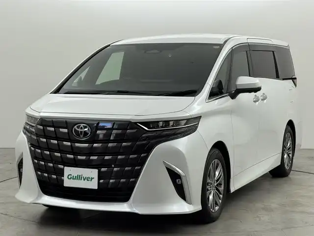 トヨタ アルファードハイブリット Z 福岡県 2024(令6)年 1.5万km プラチナホワイトパールマイカ 純正１４型ＤＡナビ／全方位カメラ　/ワイヤレス充電　/デジタルルームミラー　/ビルトインETC２．０　/前後ドライブレコーダー　/トヨタセーフティセンス　/レーダークルーズコントロール　/コーナーセンサー　/衝突軽減ブレーキ　/レーンキープ　/ブラインドスポットモニター　/アクセル踏み間違い防止　/両側電動スライドドア　/パワーバックドア　/シートベンチレーション／ヒーター　/ステアリングヒーター　/シートメモリー付きパワーシート　/３眼ＬＥＤ