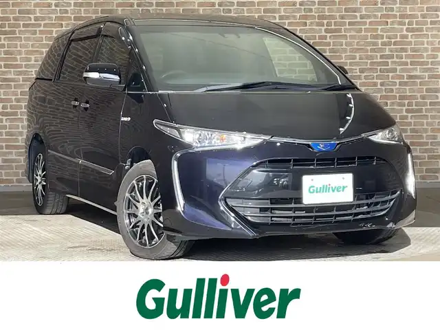 トヨタ エスティマ ハイブリッド アエラス プレミアム G 岩手県 2016(平28)年 11.9万km スパークリングブラックパールクリスタルシャイン ４WD/両側パワースライドドア/リアエアコン/電動格納サードシート/D席パワーシート/プリクラッシュセーフティ/レーンアシスト/クルーズコントロール/バックカメラ/横滑り防止装置/先行車発進告知機能/アイドリングストップ/オートハイビーム/オートライト/パワーバックドア/純正ナビ/純正LEDヘッドライト/シートヒーター/オットマン/ドライブレコーダー/ETC/社外１７インチアルミホイール/AC100V電源