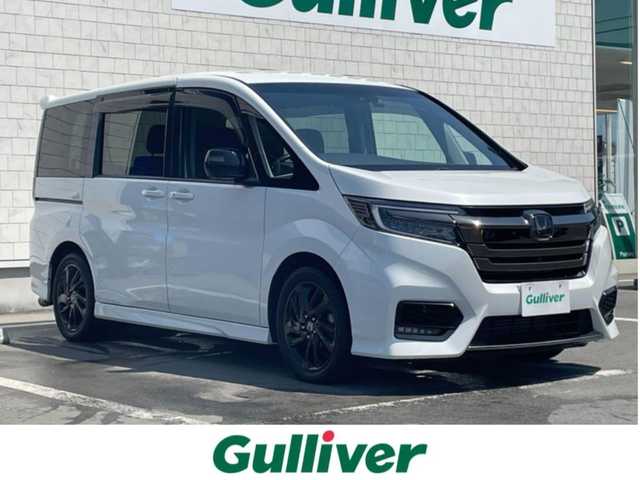 ホンダ ステップワゴン スパーダクールスピリット HセンシングBスタイル 静岡県 2019(令1)年 2.6万km プラチナホワイトパール ナビ装着用スペシャルパッケージ＋ETC車載器　ナビ連動/マルチビューカメラシステム/Honda SENSING/1列目シート用i-サイドエアバッグシステム＋サイドカーテンエアバッグシステム(1-3列目シート対応)/リア両側パワースライドドア/トリプルゾーンコントロール・フルオートエアコンディショナー/LEDヘッドライト(オートレベリング/オートライトコントロール機構付)/運転席＆助手席シートヒーター/Hondaスマートキーシステム/スポーツペダル/BLACK STYLE専用17インチアルミホイール/BLACK STYLE専用エクステリア/インテリアBLACK内装/純正10インチメモリナビ・フルセグＴＶ/ＣＤ・ＤＶＤ・Bluetooth再生/パドルシフト/スタッドレス社外アルミホイール車載/マフラーカッター