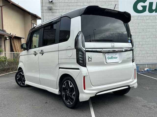 ホンダ Ｎ ＢＯＸ カスタム G EX ターボ ホンダセンシング 静岡県 2017(平29)年 4.6万km プレミアムホワイトパールⅡ ターボ車/純正８インチプレミアムインターナビ/（AM/FM/CD/DVD/BT)/フルセグTV/バックカメラ /両側パワースライドドア /レーダークルーズコントロール/ビルトインETC/ハーフレザーシート/ホンダセンシング /衝突被害軽減システム/レーンキープアシスト/横滑り防止装置/スマートキー/プッシュスタート/パドルシフト/電格ミラー/無限グリル/LEDヘッドライト/スペアキー×１/アイドリングストップ/ドアバイザー /純正１５インチアルミホイール/保証書