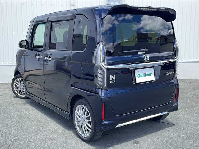 ホンダ Ｎ ＢＯＸ カスタム L ターボ 三重県 2022(令4)年 3.8万km ミッドナイトブルービームM 純正SDナビ、フルセグTV/純正CD、DVD再生、BT、MSV/衝突被害軽減ブレーキ/レーンキープアシスト/両側パワースライドドア/追従型クルーズコントロール/ハーフレザーシート/シートヒーター/コーナーセンサー/ドライブレコーダー/パドルシフト/ビルトインETC/電動パーキング/オートホールド/ウィンカーミラー/LEDオートライト/フォグランプ/スマートキー/プッシュスタート/電動格納ミラー/ステアリングリモコン/カーテンエアバック/フロアマット/ドアバイザー