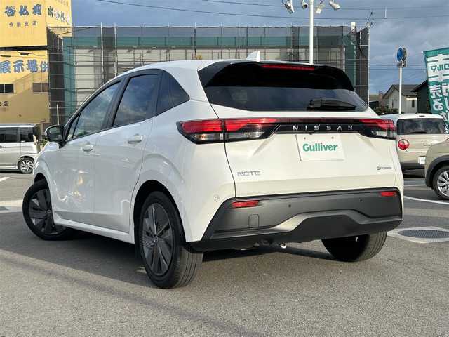 日産 ノート X 愛媛県 2022(令4)年 8万km ホワイト 禁煙車/登録時走行距離：79517km/ETC2.0/メーカーオプション純正ナビ/BT/AM・FM/HDMI/フルセグ/ワイヤレス充電/インテリジェントクルーズコントロール/プロパイロット/ブラインドスポットモニター/オートホールド