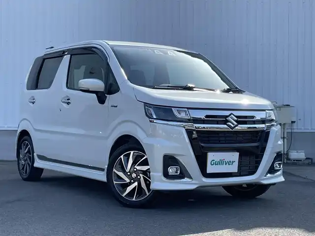スズキ ワゴンＲ カスタムＺ HYBRID ZT 愛媛県 2023(令5)年 1.9万km ピュアホワイトP セーフティサポート/デュアルカメラブレーキサポート/後退時ブレーキサポート/車線逸脱警報/アダプティブクルーズコントロール/前後誤発進抑制機能/純正8インチナビ/　CD/DVD/Bluetooth/フルセグTV/バックカメラ/ビルトインETC/D席シートヒーター/LEDヘッドライト/純正15インチAW/革巻きステアリング/パドルシフト/プッシュスタート/ドアバイザー/ブルーミラー/フロントフォグ/フロアマット/スペアキー×1/保証書/取説書