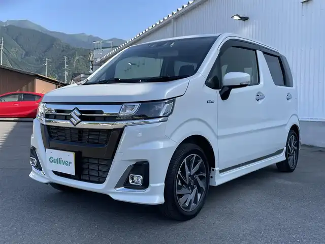 スズキ ワゴンＲ カスタムＺ HYBRID ZT 愛媛県 2023(令5)年 1.9万km ピュアホワイトP セーフティサポート/デュアルカメラブレーキサポート/後退時ブレーキサポート/車線逸脱警報/アダプティブクルーズコントロール/前後誤発進抑制機能/純正8インチナビ/　CD/DVD/Bluetooth/フルセグTV/バックカメラ/ビルトインETC/D席シートヒーター/LEDヘッドライト/純正15インチAW/革巻きステアリング/パドルシフト/プッシュスタート/ドアバイザー/ブルーミラー/フロントフォグ/フロアマット/スペアキー×1/保証書/取説書