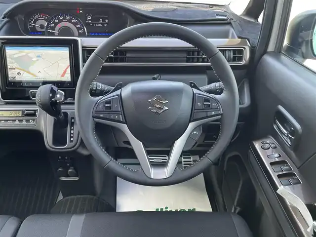 スズキ ワゴンＲ カスタムＺ HYBRID ZT 愛媛県 2023(令5)年 1.9万km ピュアホワイトP セーフティサポート/デュアルカメラブレーキサポート/後退時ブレーキサポート/車線逸脱警報/アダプティブクルーズコントロール/前後誤発進抑制機能/純正8インチナビ/　CD/DVD/Bluetooth/フルセグTV/バックカメラ/ビルトインETC/D席シートヒーター/LEDヘッドライト/純正15インチAW/革巻きステアリング/パドルシフト/プッシュスタート/ドアバイザー/ブルーミラー/フロントフォグ/フロアマット/スペアキー×1/保証書/取説書